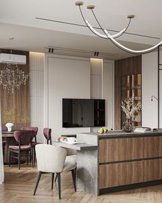 a modern kitchen and dining room with wood flooring