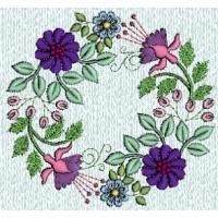 a cross stitch pattern with purple flowers and green leaves in the center on a white background