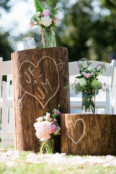 wedding decorations made out of wood and flowers