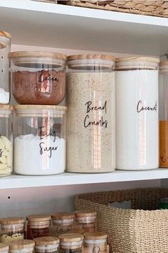 the shelves are filled with jars containing different types of sugars and other things in them