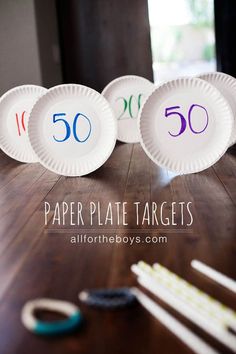 three paper plates with the number 50 on them