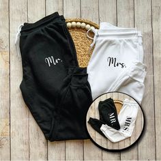 two pairs of black and white pants with the word mr and mrs written on them