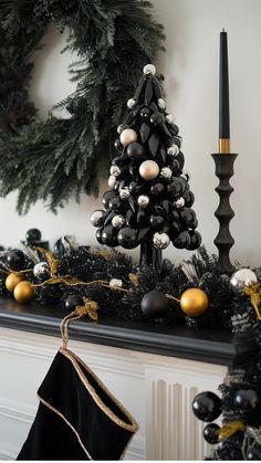 Black Christmas tree with silver and gold ornaments on a mantel, decorated with a garland and a black candle. Christmas Decorations Mantle, Thanksgiving Living Room Decorations, Christmas Mantle Decorations, Fall And Christmas Decor, Tree Trunk Ideas, Decorations After Christmas, Garland Fireplace, Farmhouse Christmas Decorations