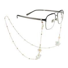 PRICES MAY VARY. Versatile Design: This 3-in-1 accessory functions as an eyeglasses chain, mask chain, or stylish necklace, making it perfect for any occasion Unique Pendant: This eyeglass chain is adorned with a charming unique pendant that adds a whimsical touch to your look Adjustable and Secure: Featuring adjustable metal coil retaining loops on both ends, it easily fits most eyeglass frames and ensures your eyewear stays secure Quality Materials: Crafted with 14K gold brass fittings, this h Eyeglasses Chain, Chain Mask, Eyewear Chain, Women's Glasses, Stylish Eyeglasses, Mask Chain, Necklace Making, Silicone Rings, Stylish Necklace