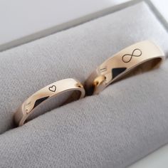 The heart is a symbol of love and infinity is a symbol of eternity. These two symbols complement each other and form endless love. You can have them on the outside of your wedding rings. I will gladly make them for you. Couple Rings Wedding Gold With Letters, Couple Rings Wedding Gold Infinity, Engraved Rings Personalized Wedding, Gold Ring For Couple, Infinity Couple Rings, Couple Bands Rings Gold, Engagement Rings Couple Gold With Name, Couple Ring Designs Gold, Couple Rings Design