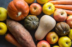 an assortment of fruits and vegetables on a table