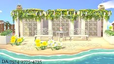 an animated image of a patio with chairs and flowers on the ground next to water