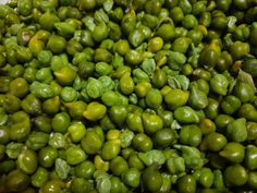 green peas are piled up in a pile