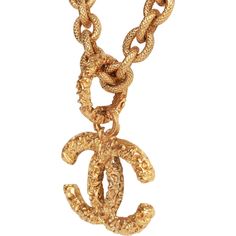 This vintage Chanel necklace is in 24K gold plated metal and has a lava textured CC logo pendant and a spring ring closure. Origin: FranceCollection: 94ACondition: Vintage; Excellent. Minor signs of wear, including light scratching, pitting, and tarnishingAccompanied by: Chanel boxMeasurements: 16.5" chain, 2" x 1.5" pendant Chanel Box, Chanel Necklace, Vintage Fall, Cc Logo, Vintage Chanel, Gold Pendant Necklace, Spring Rings, Dior Bag, Vintage Necklace