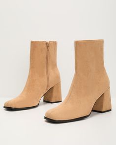 Designed to keep you stylish and comfortable through the season and beyond is the Fall Hues Block Heel Ankle Boots. Featuring a modern square toe and a sleek block heel, they add the perfect amount of height, while keeping you comfortable enough to wear all day—or dance all night. Pair them with everything from dresses to jeans, the Fall Hues Boots bring a touch of modern flair to any outfit. Fits true to size Please note: Fabrications vary between shades Heel Height: 3.25" Shaft Height: 5.75" Zipper closure Square toe Block heel Dance All Night, Block Heel Ankle Boots, Heel Ankle Boots, Swimwear Bottoms, Modern Square, Dresses By Length, Shopping Day, Fall Shopping, Heeled Loafers