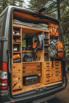 the back end of a van filled with camping gear