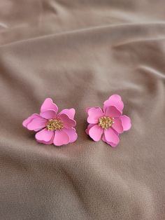 Pink hand painted leather earrings.  Solid 14 k gold center and post. Hand Painted Earrings For Party, Hand Painted Party Earrings, Elegant Hand-painted Flower Earrings, Painted Leather Earrings, Hand Painted Leather, Painting Leather, Cat Earrings, Art Deco Ring, Floral Earrings