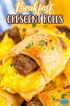 breakfast crescent rolls on a plate with cheese and sausage