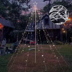 a lighted christmas tree in the yard with lights on it and an image of a house behind it