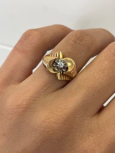 "Gold Spairel Tank Ring - 0.28CT Diamond, 18k Yellow Gold Ring, twister Ring, tourbillon Ring, Chunky Gold Ring, Estate Jewelry, Vintage ring \"Jewelry Material: Yellow Gold 18k (the gold has been tested by a professional) Total Carat Weight: 0.06ct (Approx.) Total Metal Weight: 4.23g Size: 7.25 US \\ 17.45 mm  Grading Results: Stone Type: Diamond Shape: Round Carat:0.06 ct (Approx.), Stones quantity: 1 Color: G Clarity: VS Spiral Ring With A Modern Twist For Formal Occasions, Luxury Diamond Spiral Ring, Modern Twist Yellow Gold Jewelry With Single Diamond, Elegant Spiral Yellow Gold Ring, Modern Twist Oval Ring For Formal Occasions, Elegant Twisted Anniversary Rings, Spiral 14k Gold Wedding Ring, Spiral Gold Diamond Ring, 14k Gold Spiral Wedding Ring