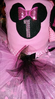 a minnie mouse hat with pink tulle and sequins