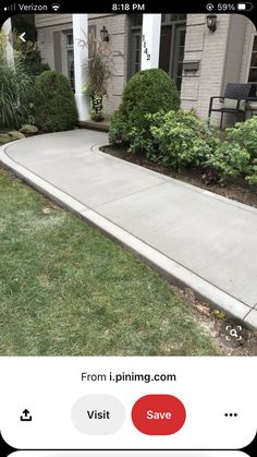 a sidewalk with grass and bushes in front of a house that is for sale on the app