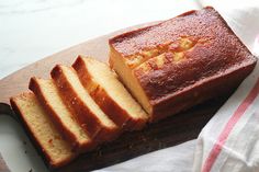 a loaf of bread sitting on top of a cutting board