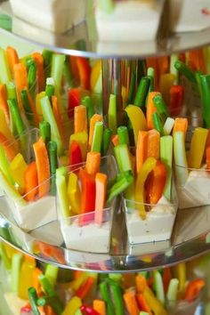 several trays filled with different types of food