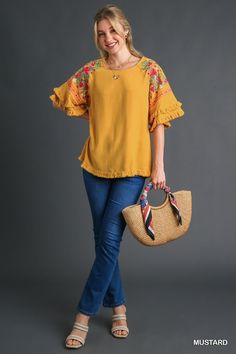 Umgee Linen blend top with layered flounce sleeves and embroidery. Fringe hemmed. Super cute blouse! Color: Mustard Sizes: S-M-L True to sizeOur model is 5' 9" wearing a small 55% Linen, 45% Cotton, importedO5/K7342 Tiered Sleeve, Embroidered Linen, Cute Blouses, Flounce Sleeve, Linen Blend, Mustard, Sleeve Top, Super Cute, Embroidery