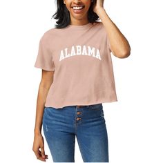 Embrace casual style while repping your Alabama Crimson Tide pride in this Clothesline Cropped T-Shirt. Made from 100% heavyweight cotton, this Official League tee delivers an authentically comfy feel reminiscent of sun-dried clothes fresh off the line. Its cropped hem with raw edge adds a modern, stylish touch. College Graphic Tee With Crew Neck, Summer Collegiate Relaxed Fit Tops, Collegiate Style Summer Tops With Relaxed Fit, Summer Collegiate Style Tops With Relaxed Fit, Relaxed Fit Collegiate Summer Tops, Short Sleeve College Tops With Text Print, Collegiate Relaxed Fit Top With Text Print, College Graphic Tee With Short Sleeves, College Short Sleeve Tops With Text Print