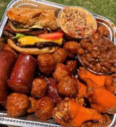 a tray filled with lots of different types of food