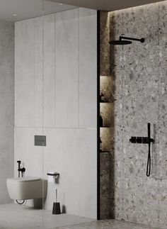 a modern bathroom with marble walls and flooring, including a large shower head in the center