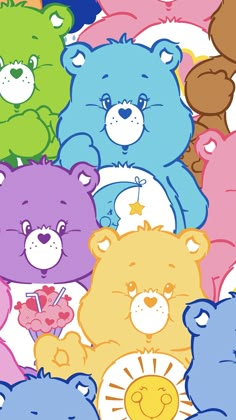 a group of colorful teddy bears sitting next to each other