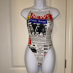 Newspaper Print Spaghetti Strap Bodysuit. Never Worn. Size Medium Trendy Sleeveless Printed Bodysuit, Trendy Printed Sleeveless Bodysuit, Casual Printed Summer Bodysuit, Cotton Fitted Bodysuit For Vacation, Fitted Cotton Bodysuit For Vacation, Trendy Printed Summer Bodysuit, Trendy Swimwear With Spaghetti Straps, Summer Cotton Bodysuit With Graphic Print, Chic Summer Bodysuit By Forever 21