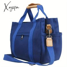 45922086060251 Blue Canvas Bag With Zipper For Daily Use, Blue Canvas Bag With Zipper Closure, Blue Canvas Bag With Zipper Pocket For School, Blue Canvas Bag With Adjustable Strap For School, Blue Canvas School Bag With Adjustable Strap, Navy Large Capacity Shoulder Bag For School, Blue Canvas Bag With Zipper For Everyday, Blue Canvas Satchel For School, Blue Canvas Satchel With Zipper Pocket