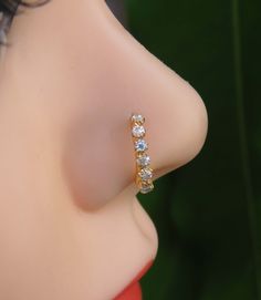 a close up view of the back of a mannequin's head with a ring on it