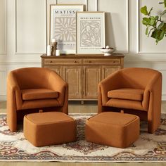 an orange chair and footstool sitting on top of a rug in front of a dresser