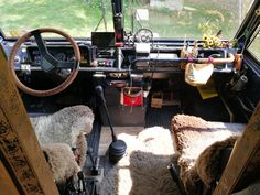 the interior of an old car with sheep in it