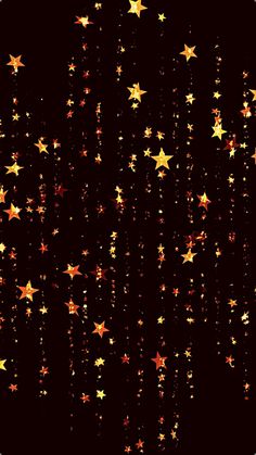 gold stars are falling down from the dark sky, creating a festive pattern on this black background