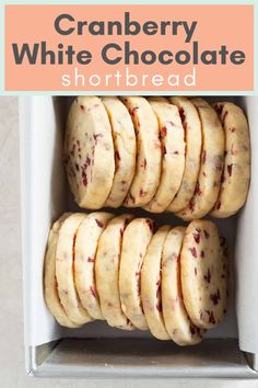 cranberry white chocolate shortbread cookies in a box with the title above it