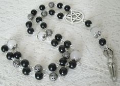 "This beautiful wiccan rosary has black obsidian beads, onyx beads, sterling silver plated bead caps, sterling silver plated filigree beads, pewter silver pentacle and a pewter silver goddess. A lovely way to pray to the Goddess and meditate. 20\" long." Black Gothic Jewelry With 8mm Beads, Mystical Black Jewelry For Healing, Goddess Magic, Silver Goddess, Wicca Jewelry, Wiccan Jewelry, Pagan Jewelry, Onyx Bead, Black Obsidian