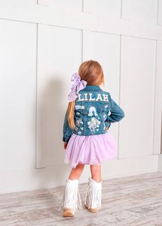 This adorable fairy denim jacket will be sure to make heads turn. Jackets are made once ordered. The layout will be arranged to fit the space of the jacket. This is a handmade item so the product may vary. This is a perfect staple to add to any outfit!  Details Soft fabric with a hint of spandex offers a comfy and stretchy fit The button-front design allows for easy layering Multiple pockets add functional flair to her look Can be worn buttoned up or open to create a variety of cute looks Pearl Name Patches and gems are an add-on. Please specify the names and hair color of the fairy in the notes. Big Girl Sizes we suggest sizing up Fitted Long Sleeve Cute Denim Jacket, Cute Fitted Long Sleeve Denim Jacket, Fall Long Sleeve Outerwear For Birthday, Spring Birthday Long Sleeve Outerwear, Patched Denim Jacket, Pearl Name, Letter Jacket, Patch Jacket, Denim Jacket Patches