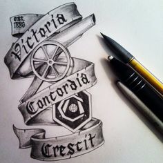 a pencil drawing of a ribbon with the words victoria, california and crest on it