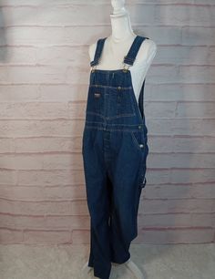 Vintage Adult Osh Kosh Overalls 38 Waist Sanfordized...I had no idea what this meant, but it means that the denim has been shrunk in length, stretched and fixed at the mill which prevents further shrinkage. this is a great pair of overalls, but no tag is present . They have also been hemmed and there is 3 inches present in the fold to the hemming which has been done in a loose loop stitch and can easily be removed. PLEASE USE MEASUREMENTS FOR SIZING Waist : 19 inches (doubled is 38 inches) Hips: 23: inches (doubled is 46 inches) Inseam: 24 inches with 3 inch hem, could be inseam of 27 inches total Garment has been laundered in mild, plant-based detergent and tumbled dry. Excellent condition. You are buying the item in the photo All sales are final.I do not take returns. If you have any que Oshkosh Overalls, Denim Overalls, Overalls, Work Wear, Halloween Shopping, Art Collection, Im Not Perfect, Bathing Beauties, Adult Outfits