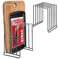 a cell phone is next to a magazine rack