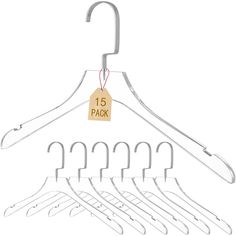 a white hanger with five pairs of clothes hanging from it's hooks and the price tag is 15 pack