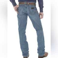 Sits Lower On Waist Slim Seat, Thigh, & Knee Boot Cut Zip Fly With Button Closure 2 Back Pockets 100% Cotton Western Style Denim Blue Cotton Bottoms, Casual Denim Blue Bottoms For Rodeo, Blue Straight Leg Bottoms For Rodeo, Casual Light Wash Bottoms For Rodeo, Blue Cotton Western Style Bottoms, Casual Blue Bottoms For Rodeo, Wrangler Cowboy Cut, Vintage Wrangler Jeans, Camo Jeans