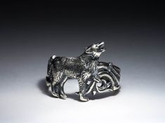 Ring size is adjustable and suitable for sizes US 5.5 - 9 / 16 - 19 mm. (Can be made closed according to your size as made-to-order). Howling Wolf Ring can also be made in 585 gold or gold-plated. You can find a lot of this style jewelry on my store page. I can implement your any idea - just send me a letter describing your wishes via contact form. IF YOU NEED "SOLD OUT" SIZE OR MATERIAL OR NEED MORE THAN 1 JUST CONTACT ME! PRODUCTION TIME IS 1-2 WEEKS! Howl Wolf, Wolf Rings, Medieval Artwork, Fantasy Clothes, Wolf Ring, Wolf Jewelry, Celtic Patterns, Howling Wolf, Adjustable Jewelry