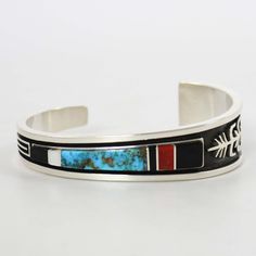 Sterling Silver Cuff Bracelet with Channel Inlaid Jet, Mother of Pearl Shell, Mediterranean Coral, and Natural Kingman Turquoise from Arizona. .25” Cuff Width 5.25” Inside Measurement, plus 1” opening (6.25" Total Circumference - Small-Medium) Zuni Jewelry, Concho Belt, Navajo Jewelry, Stone Inlay, Southwestern Jewelry, Sterling Silver Cuff Bracelet, Kingman Turquoise, Pearl Shell, Sterling Silver Cuff