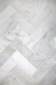 white marble herringbone pattern on the floor