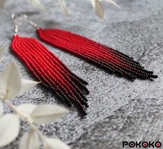 "These red beaded earrings pair amazingly with any outfit, dressy or casual. They will emphasize your individuality and compliment your personality on various occasions. Perfect for looking pulled together and on trend. They are made of high-quality Czech colored beads with sterling silver hooks and silicone plugs. Colors: red, dark red, black. Length: 4.5 inches (11.5 cm) Width: 0.78 inches (2 cm) Materials:     Czech \"Preciosa\" beads     Durable synthetic thread     Sterling silver ear hooks     Silicone plugs If you are on the hunt for a gift that will show your significant other some love, these picks are a great solution to surprise and delight. I hope you can find everything here that you were looking for. If you have any questions related to earrings design, please feel free to co Cheap Red Beaded Earrings For Holiday, Cheap Red Crafted Beaded Earrings, Cheap Red Beaded Dangling Earrings, Cheap Red Statement Beaded Earrings, Affordable Red Faceted Bead Earrings, Cheap Red Beaded Earrings For Party, Cheap Red Beaded Earrings, Cheap Red Fringe Jewelry, Cheap Red Bohemian Beaded Earrings