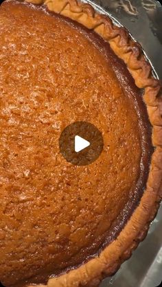 a pie sitting on top of a metal pan