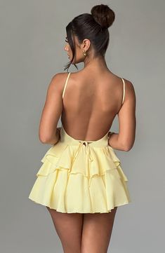 Wear this pretty playsuit on repeat, cut from our premium chiffon which is super floaty and lightweight. Featuring a layered ruffle skirt with built in shorts, this plunge neck design is backless with adjustable straps for your perfect fit. Partner with barely there heeled sandals and a bright bag. 



Colour: Lemon.

Premium non-stretch chiffon.

Fully lined.

Layered ruffle skirt with built in shorts.

Plunge neckline.

Adjustable straps.

Internal tie at waist.

Backless design.

Invisible zi Backless Slip Dress, Layered Ruffle Skirt, Maxi Dress Sale, Looks Party, Sparkle Dress, Backless Mini Dress, Backless Design, Solid Color Dress, Mini Dresses For Women