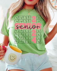 It's your last first day of school this year for every 2024 graduate! This senior 2024 graduation t-shirt has that cute groovy retro touch to it. Would make a really cute senior gift idea or a t-shirt to wear for senior portraits. Class of 2024, congrats you did it! Sizing runs true to size, but please refer to the size chart for measurements. You can size up 2xs sizes for that t-shirt dress style. This is printed directly onto the fabric so colors will be more of a 'distressed' looked. I find t Senior Year Shirts Design, Spring College Style T-shirt, Relaxed Fit T-shirt For College, Back To School, School Spirit Crew Neck T-shirt For Graduation Party, School Spirit Short Sleeve T-shirt For Graduation Party, Crew Neck T-shirt For Graduation Party, Crew Neck T-shirt With Graphic Print For Graduation Party, Casual T-shirt With Text Print For Graduation, Back To School Spirit T-shirt For College