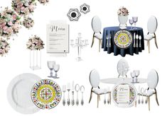 the table is set with plates, silverware and floral centerpieces on it